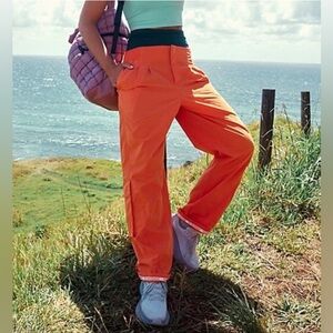 Gently worn Free People Movement Mesmerize Me Fired Up Orange Cargo Pants Medium
